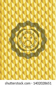 sad face icon inside shiny golden emblem. Scales pattern. Vector Illustration. Detailed.