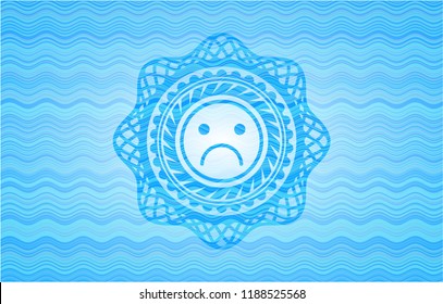 sad face icon inside sky blue water badge background.