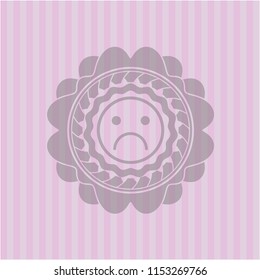 sad face icon inside vintage pink emblem