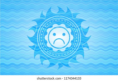 sad face icon inside water wave concept badge background.