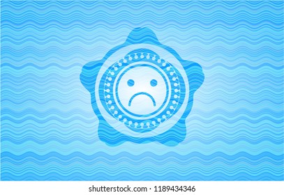 sad face icon inside water wave representation style badge.