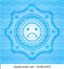 sad face icon inside water wave representation style badge.