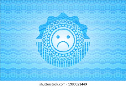 sad face icon inside water emblem background.