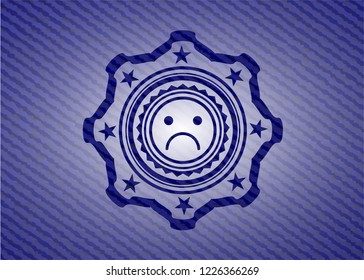 sad face icon with jean texture