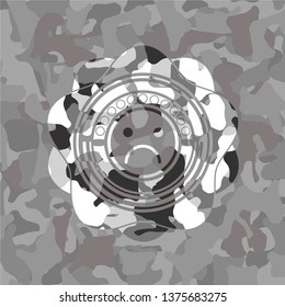 sad face icon on grey camo pattern