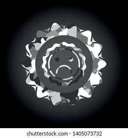 sad face icon on grey camouflaged pattern