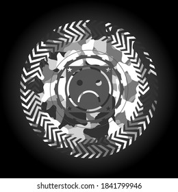 sad face icon on grey camouflaged texture. 