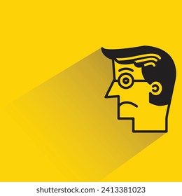 sad face icon with shadow on yellow background