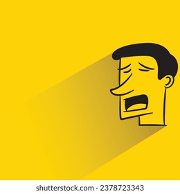 sad face with shadow on yellow background