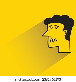 sad face with shadow on yellow background