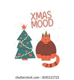 Sad and grumpy cat in sweater with deers looks at Christmas tree. Lettering Christmas mood.