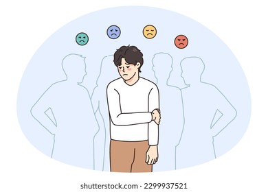 Sad guy feel lonely and uncomfortable in society. Unhappy young man suffer from solitude and loneliness in crowd, have various emotions. Frustration and depression. Vector illustration.