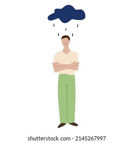 A sad guy in full height stands with his arms around himself. There is a thundercloud over the man, it is raining. The concept of mental disorder, illness.