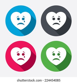 Sad heart face with tear sign icon. Crying chat symbol. Circle buttons with long shadow. 4 icons set. Vector