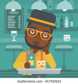 Sad man with bottle and glass.