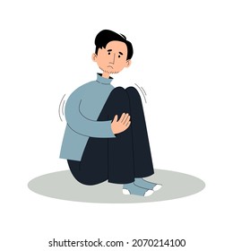 Sad man in depression sits hugging his knees. Concept anxiety, depression, bipolar disorder. Vector illustration in flat style.