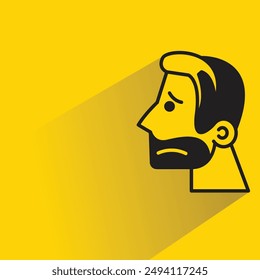 sad man face with shadow on yellow background
