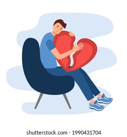 Sad man holding broken heart pieces in flat design on white background. Painful broken heart concept. Breakup relationship or divorce.