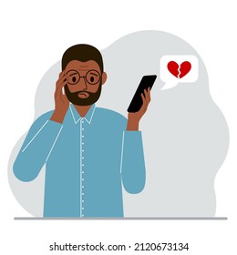 Sad man reading a message on his mobile phone. A message with a broken red heart. Vector flat illustration