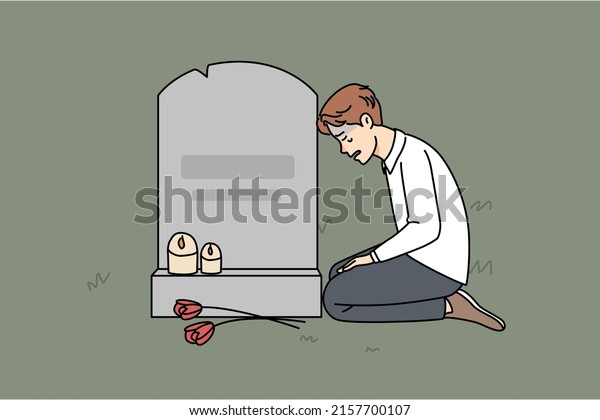Sad man sitting near grave at cemetery mourning after\
passed wife or mother. Unhappy desperate widower put flowers and\
candles on memorial day yearning and missing. Vector illustration.\
