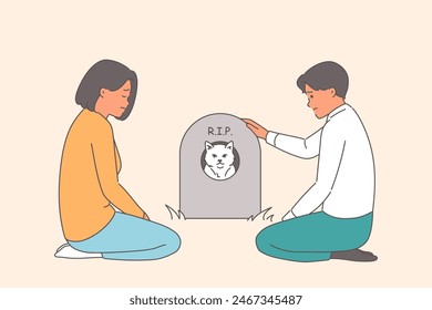 Sad people bury beloved cat sitting near gravestone with inscription rip and portrait of cute pet. Man and woman near grave in pet cemetery, mourning kitten that has become member of family