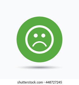 Sad smiley icon. Bad feedback symbol. Flat web button with icon on white background. Green round pressbutton with shadow. Vector