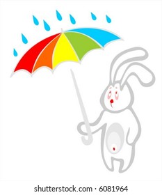 The sad white rabbit has hidden under a umbrella from a rain.