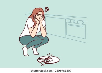 Sad woman broke plate in kitchen and is sad because of favorite saucer given by friends. Frustrated housewife girl dropped ceramic plate while cooking dinner and needs to buy new dishes