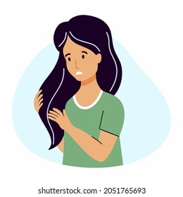 Sad woman found gray hair on her head.