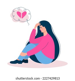 Sad woman sitting with a broken heart in her thoughts. Parting, problems in relationship, divorce, conflicts, misunderstanding and crisis in family.