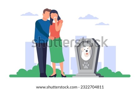 Sad young male and female couple standing near grave of their dog in cemetery. People mourn dead puppy. Pet owners despair and cry. Memorial tomb for domestic animal