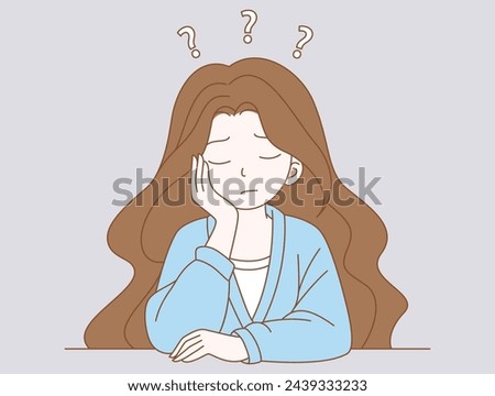 Sadness, Tired, mental depression, doubt concept. Young unhappy woman sitting touching head and feeling depressed  
