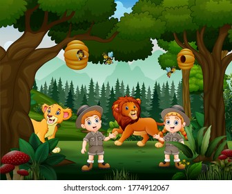 Safari boy and girl in the forest with lions