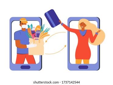 Safe delivery of food, grocery. Online order using the mobile app. Courier in a protective medical mask delivers the goods. Woman pays for purchases with a Bank card. To buy during the quarantine