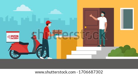 Safe pizza delivery at home during coronavirus covid-19 epidemic: delivery man bringing a pile of pizza boxes to a customer keeping a safe distance, he is wearing a protective face mask and gloves