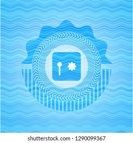 safe, safety deposit box icon inside sky blue water emblem.