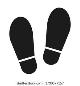 Safe social distance mark. Foot sole icon. Stand here caution sign for supermarkets. Floor label for industrial area. Step prints black silhouette.