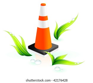 Safety cone on grass background