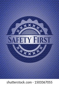 Safety First badge with denim texture. Vector Illustration. Detailed.