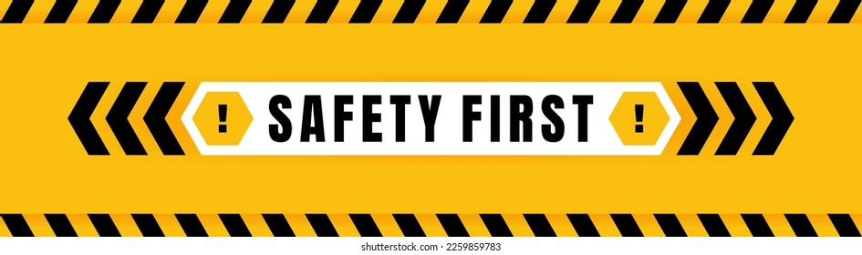 Safety first badge placed on yellow background with black and yellow line striped. Attention label with Exclamation mark on hexagon. Vector illustration.
