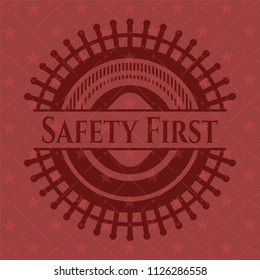 Safety First badge with red background
