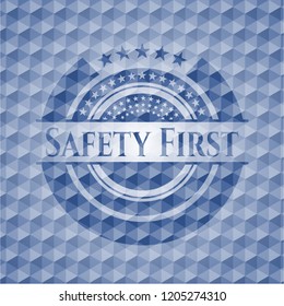 Safety First blue polygonal badge.