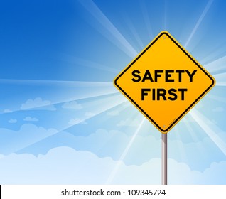 Safety First Danger Sign - Illustration of roadsign on blue background with sunshine