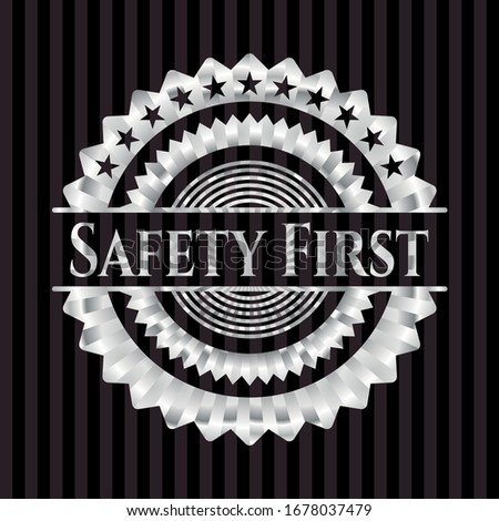 Safety First silver emblem or badge. Vector Illustration. Mosaic.