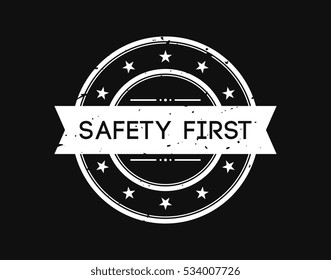 safety first. stamp mark white on black background