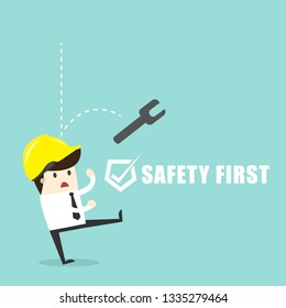 Safety first symbol with tool drop on yellow helmet on white