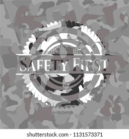 Safety First written on a grey camouflage texture