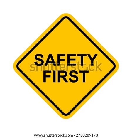 safety first yellow rhombus road sign
