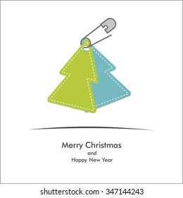safety pin and christmas tree