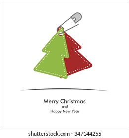 safety pin and christmas tree